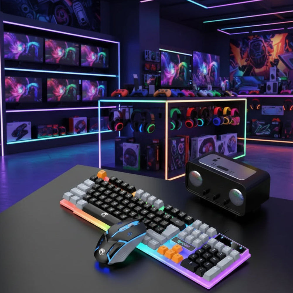 A gaming desk setup featuring a mechanical keyboard with RGB backlighting, a matching computer mouse, and a wireless headset, arranged on a dark surface with a Nintendo Switch in the background.