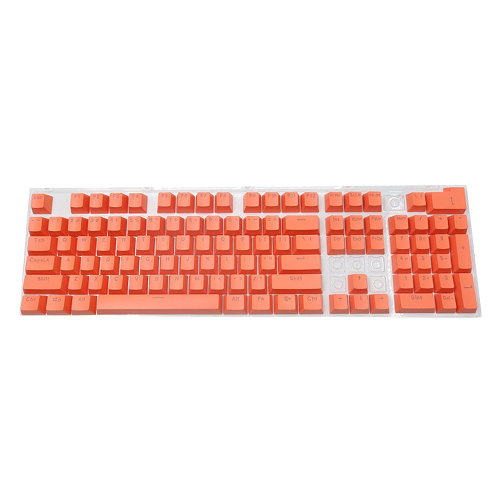 A set of orange keycaps installed on a mechanical keyboard, showcasing a variety of keys including letters, numbers, and function keys.