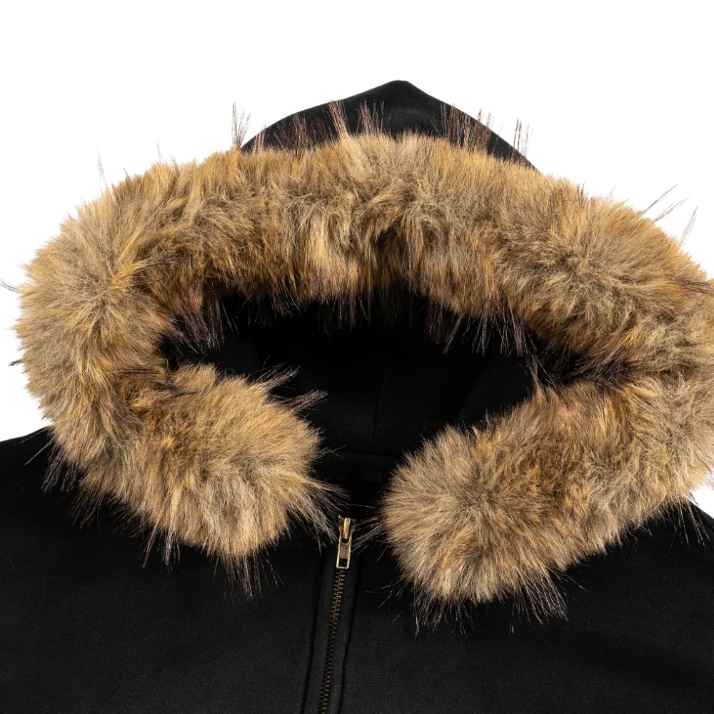 Close-up of a black hooded jacket with a large fluffy faux-fur trim in tan and brown tones, shown against a white background.