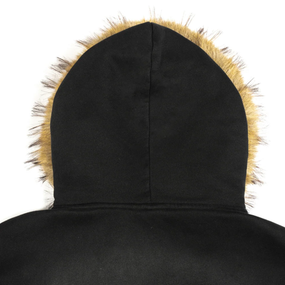 Close-up of the back of a black hooded garment with a tan and brown faux-fur trim around the hood, shown on a white background.